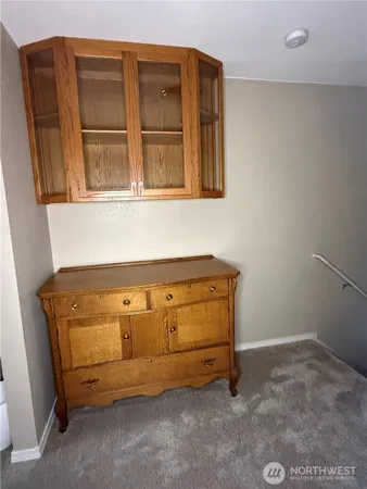 a bathroom with a sink vanity and a mirror