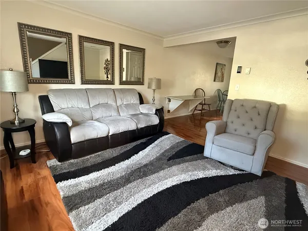 a living room with furniture and a couch