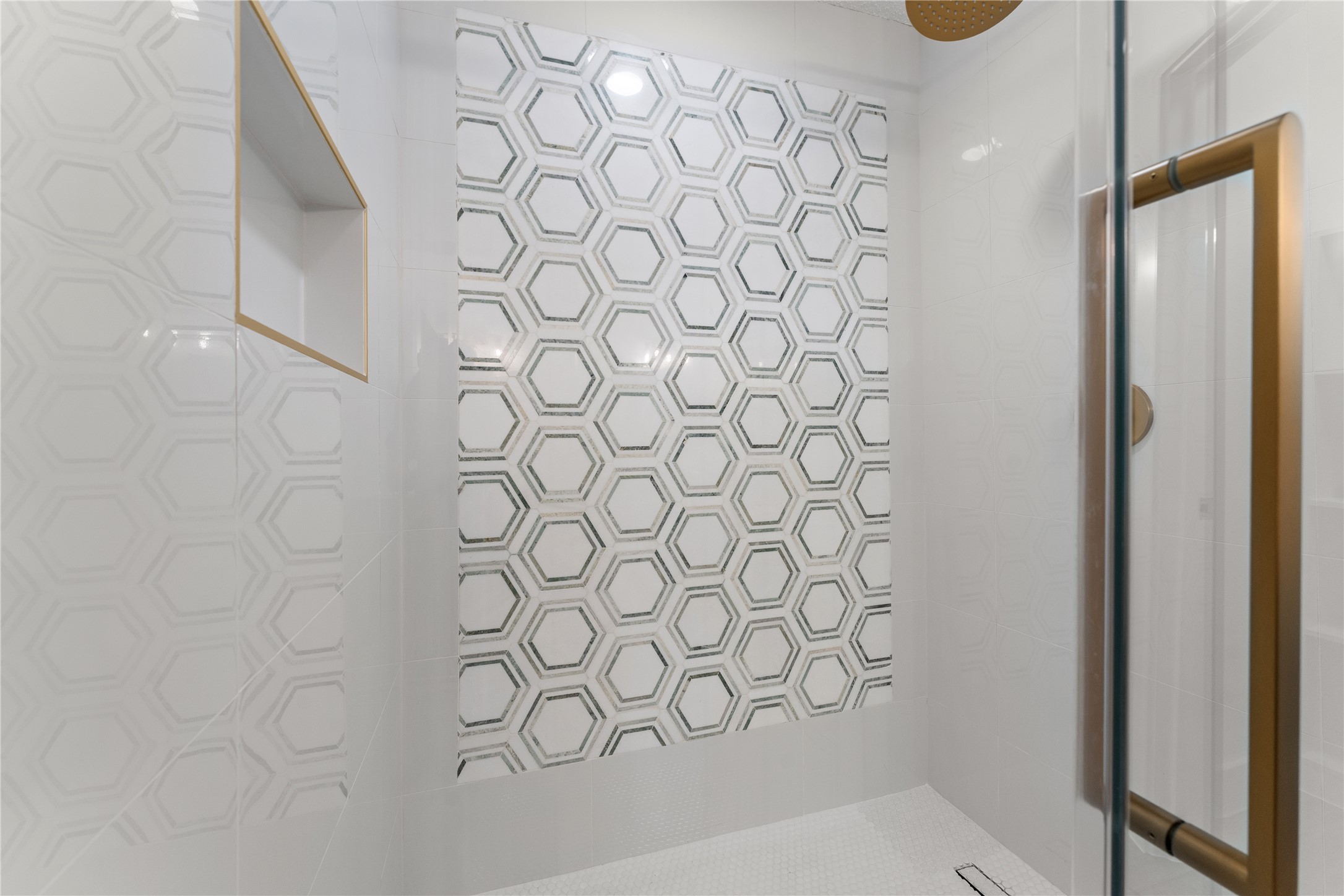 4504 Tamarack Trail Austin, TX 78727 - Photo 30 of 38 Walk-in tiled shower w/ niche and linear drain