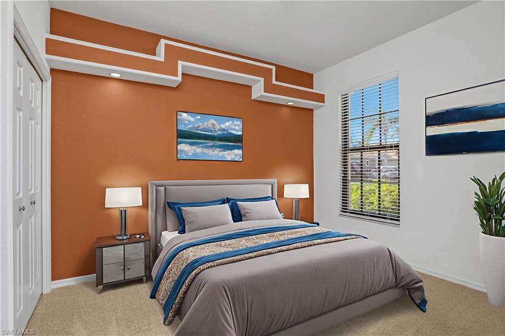 7820 Sandpine Court, Unit 2304 Naples, FL 34104 - Photo 22 of 50 a bedroom with a bed and a window