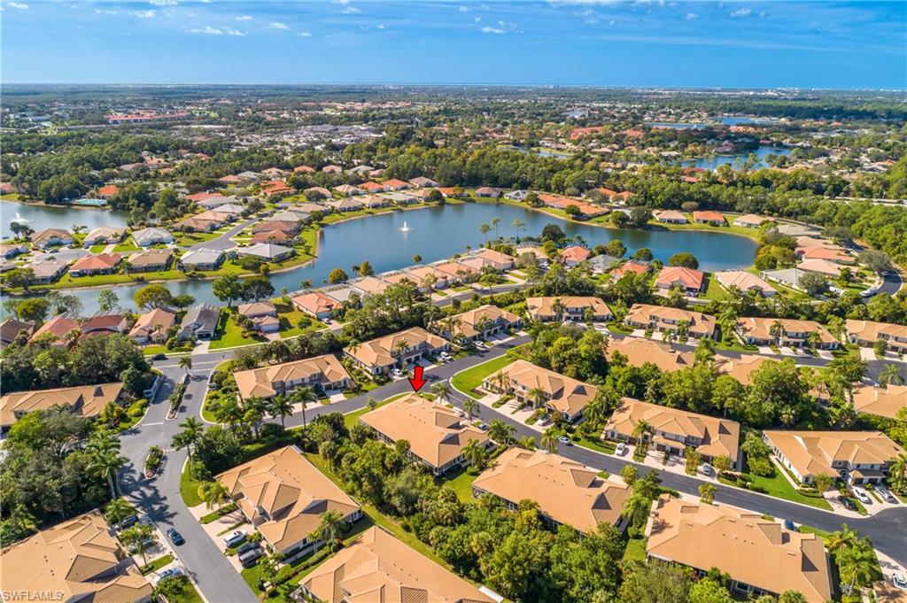 7820 Sandpine Court, Unit 2304 Naples, FL 34104 - Photo 38 of 50 an aerial view of residential houses with city view