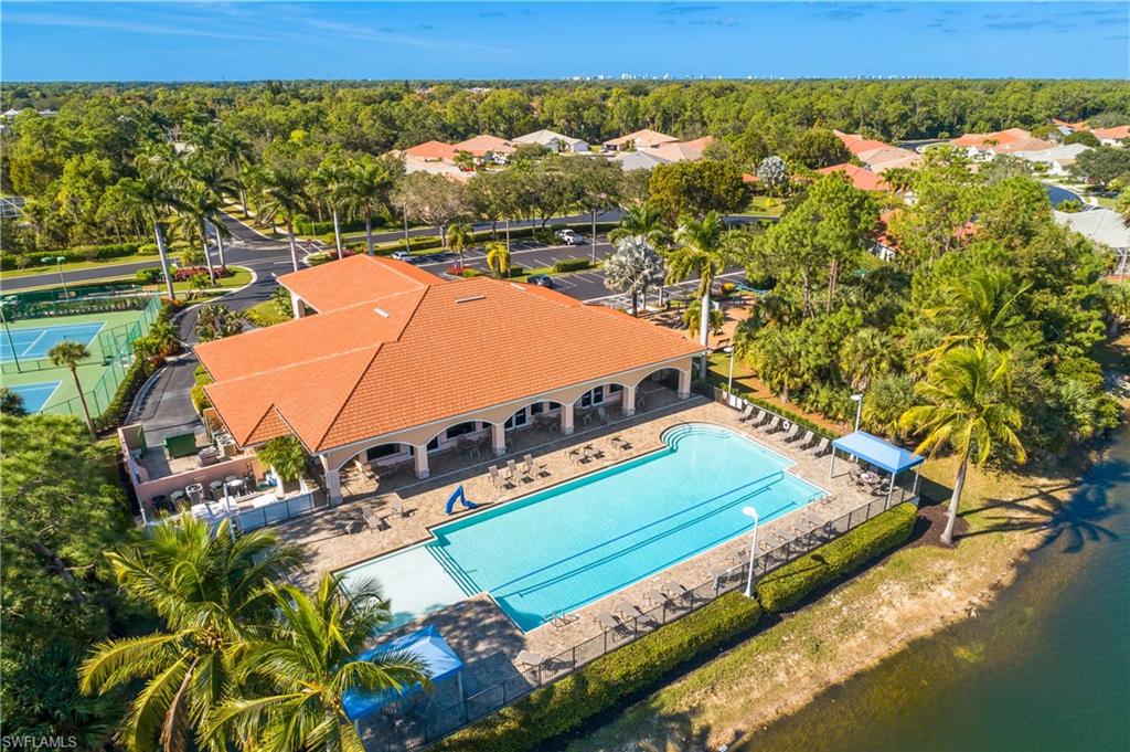 7820 Sandpine Court, Unit 2304 Naples, FL 34104 - Photo 44 of 50 a view of a tennis court