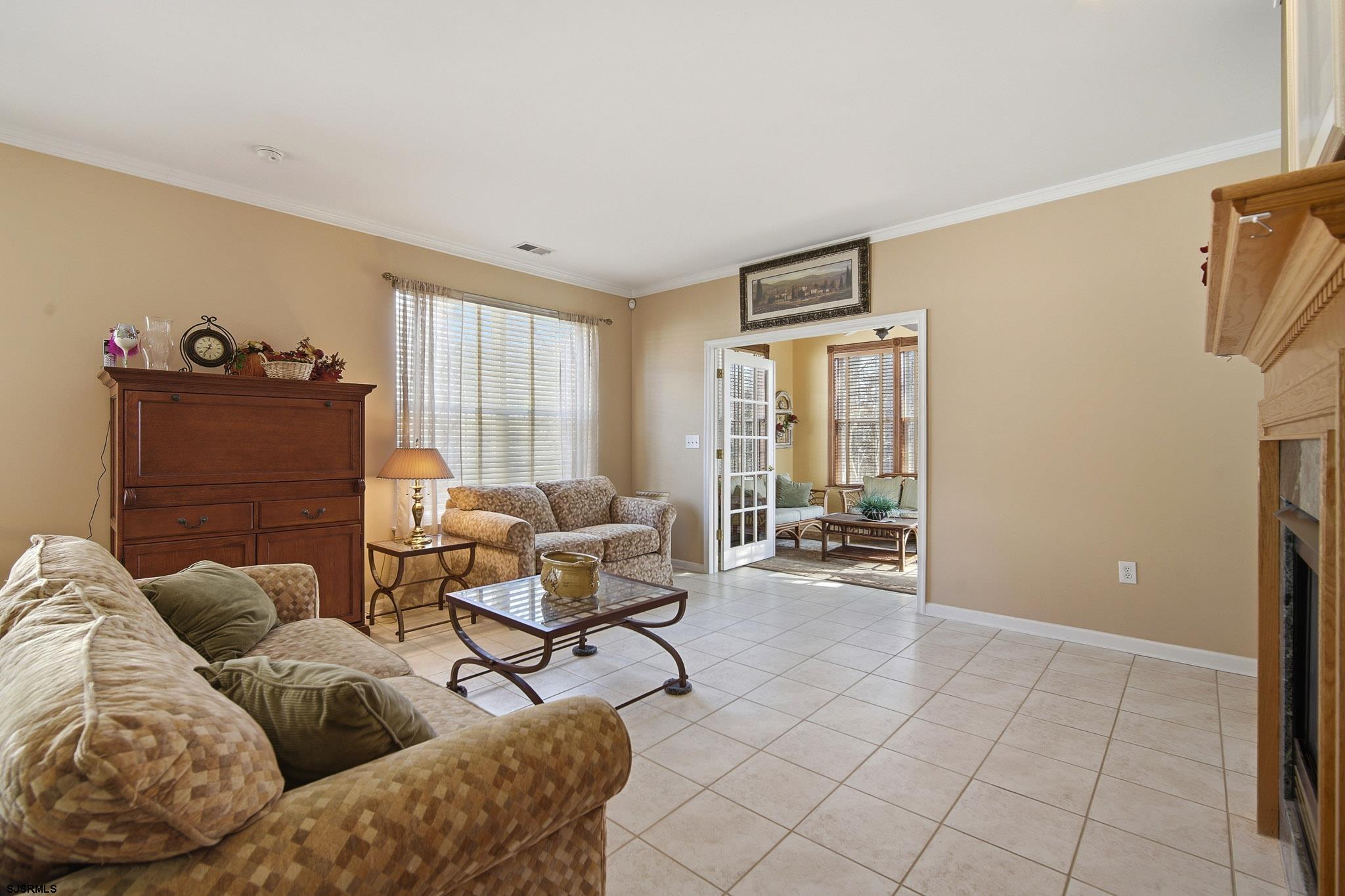 102 Warwick Road Galloway Township, NJ 08205 - Photo 13 of 45 a living room with furniture and a window