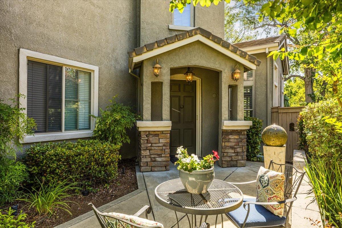a front view of house and yard with seating space