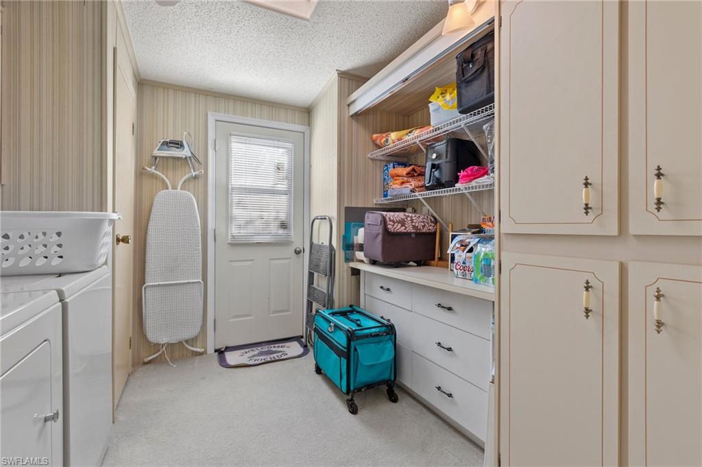 48 Oceans Boulevard, Unit 48 Naples, FL 34104 - Photo 21 of 26 a room with storage and utility