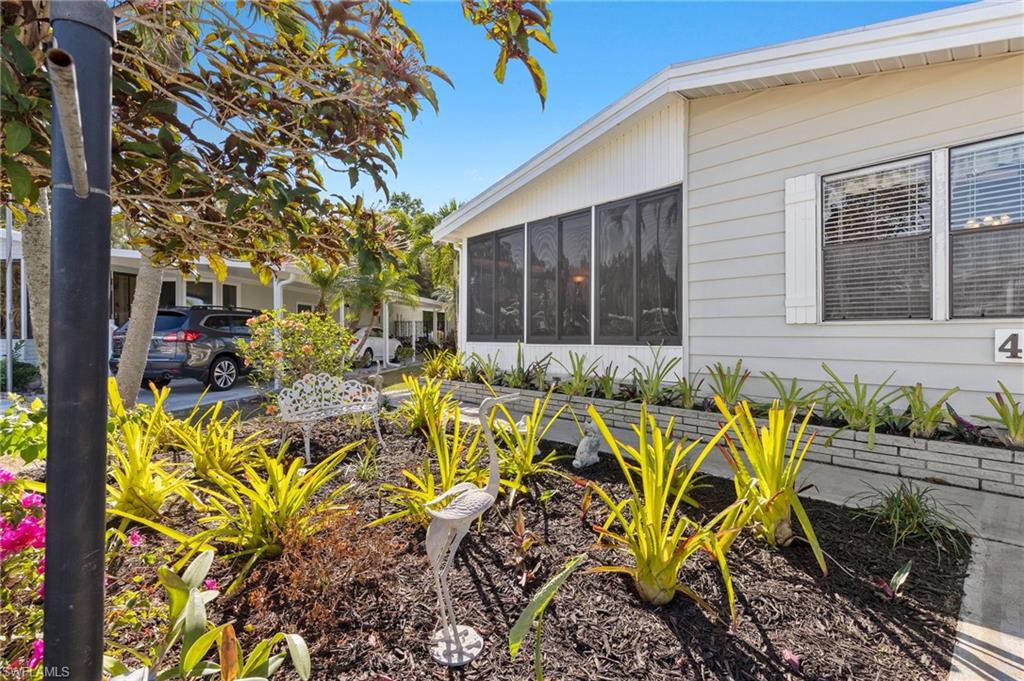 48 Oceans Boulevard, Unit 48 Naples, FL 34104 - Photo 25 of 26 a view of outdoor space yard and patio