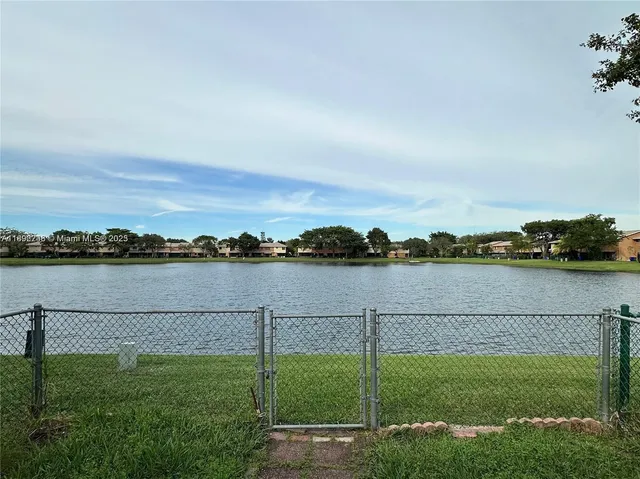a view of a lake from a yard