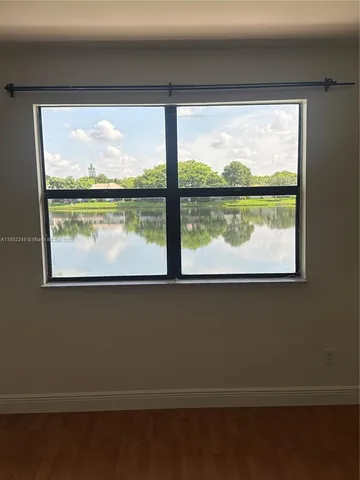 a view of a lake from a window