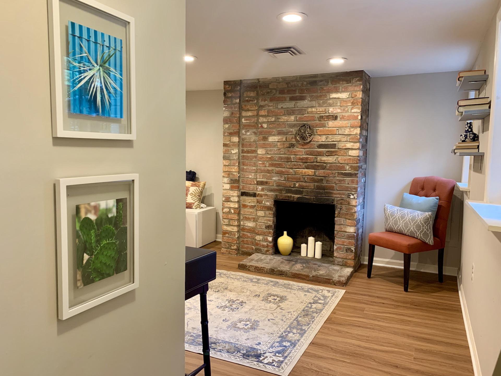 1434 A Street Southeast Washington, DC 20003 - Photo 3 of 11 Living room with exposed brick accent.