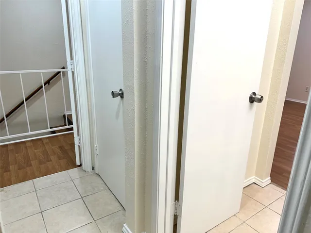 a bathroom with a window a bathtub and a shower