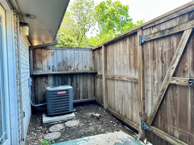 a front view of a house with a yard and a garage