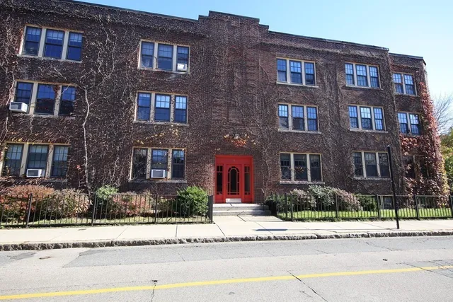 a front view of a brick building