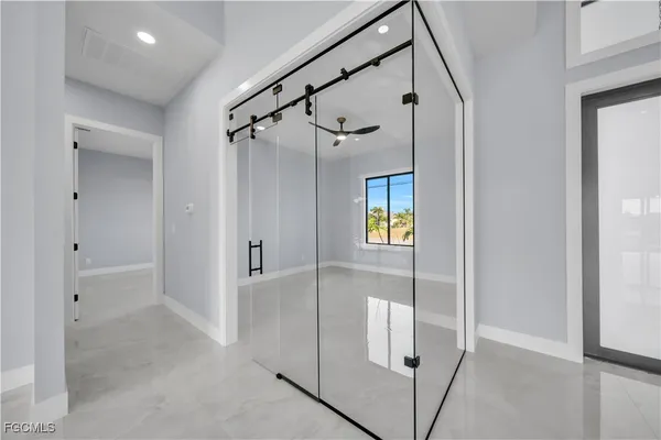 a view of an entryway with a livingroom