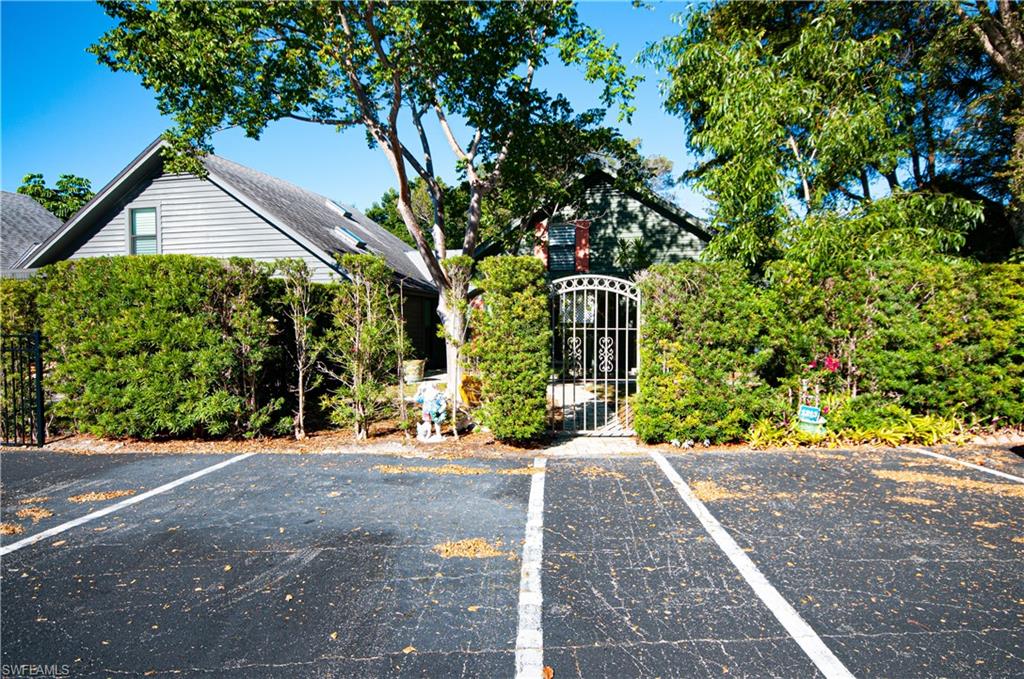 GATE TO COURTYARD, PARKING IN FRONT