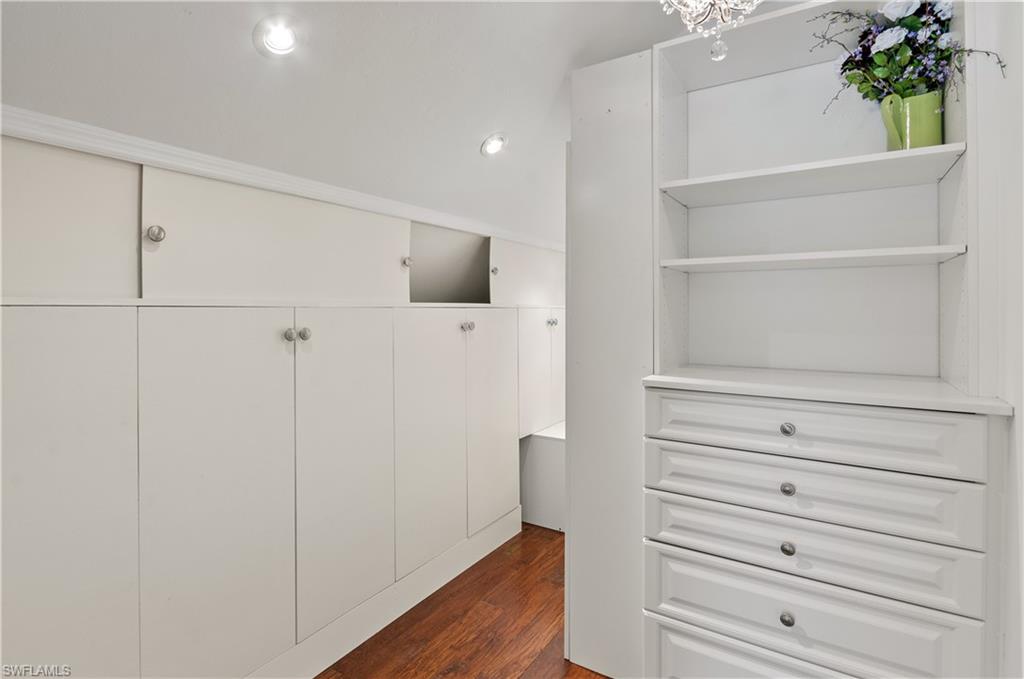 1313 Solana Road, Unit A3 Naples, FL 34103 - Photo 22 of 29 Storage, closet space, dressing room off primary bedroom in loft