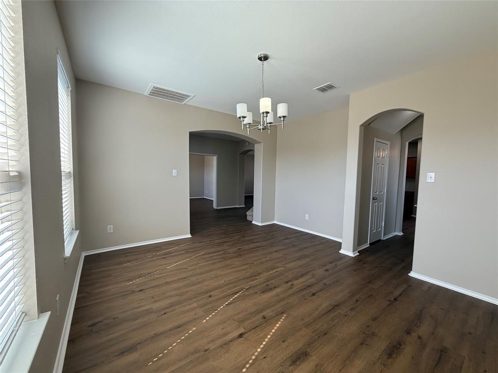 109 Rockbrook Drive Wylie, TX 75098 - Photo 15 of 34 a view of a livingroom with wooden floor