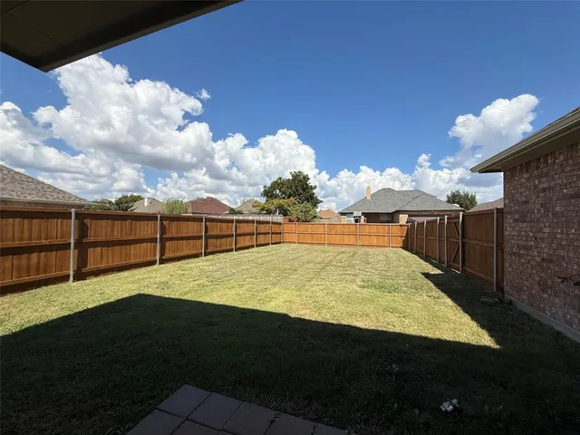a view of outdoor space and yard