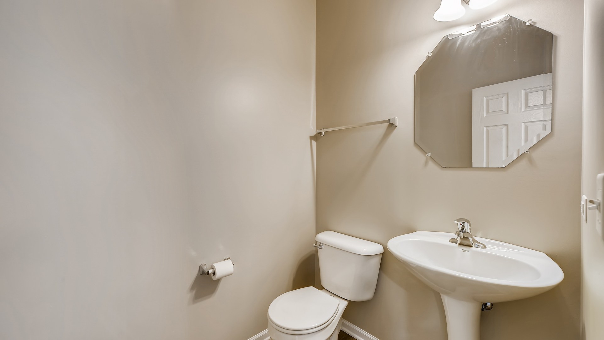 103 Willey Street Gilberts, IL 60136 - Photo 15 of 28 a bathroom with a sink mirror and toilet