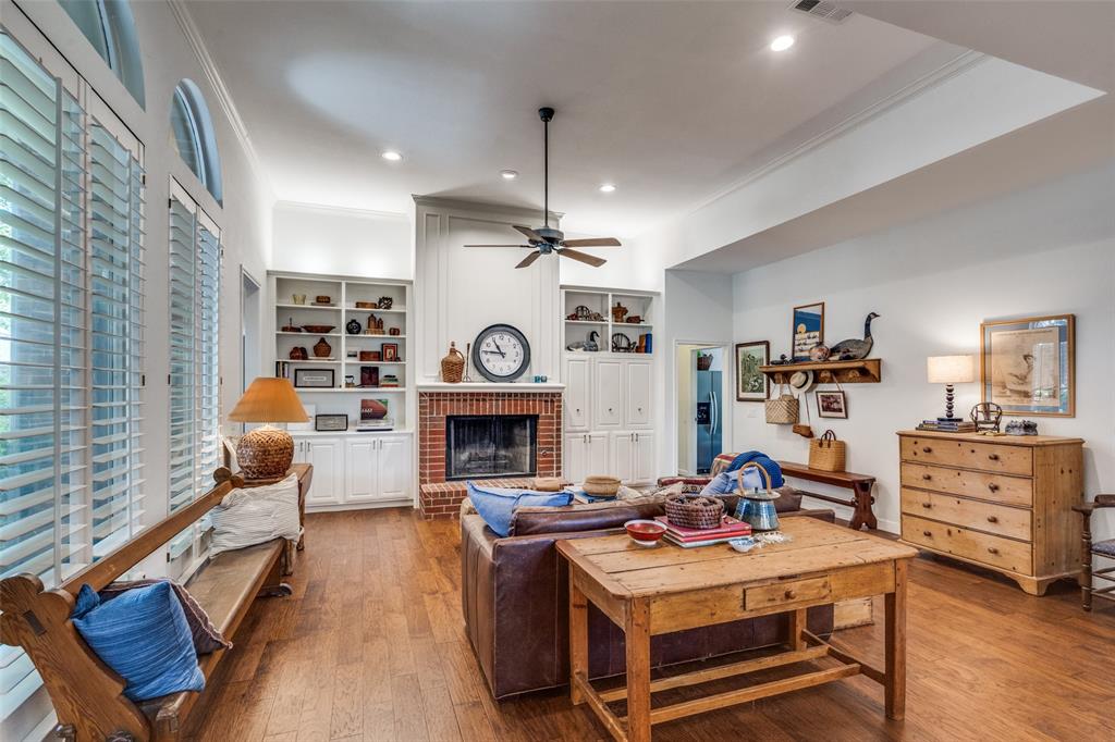3452 Hearst Castle Way Plano, TX 75025 - Photo 15 of 36 a living room with furniture and a fireplace