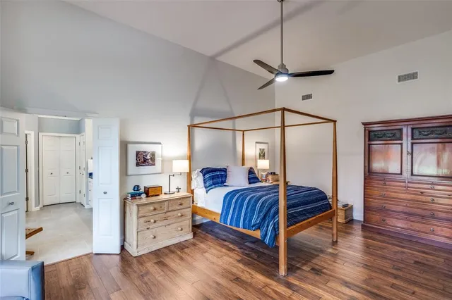 a bedroom with furniture and a fireplace