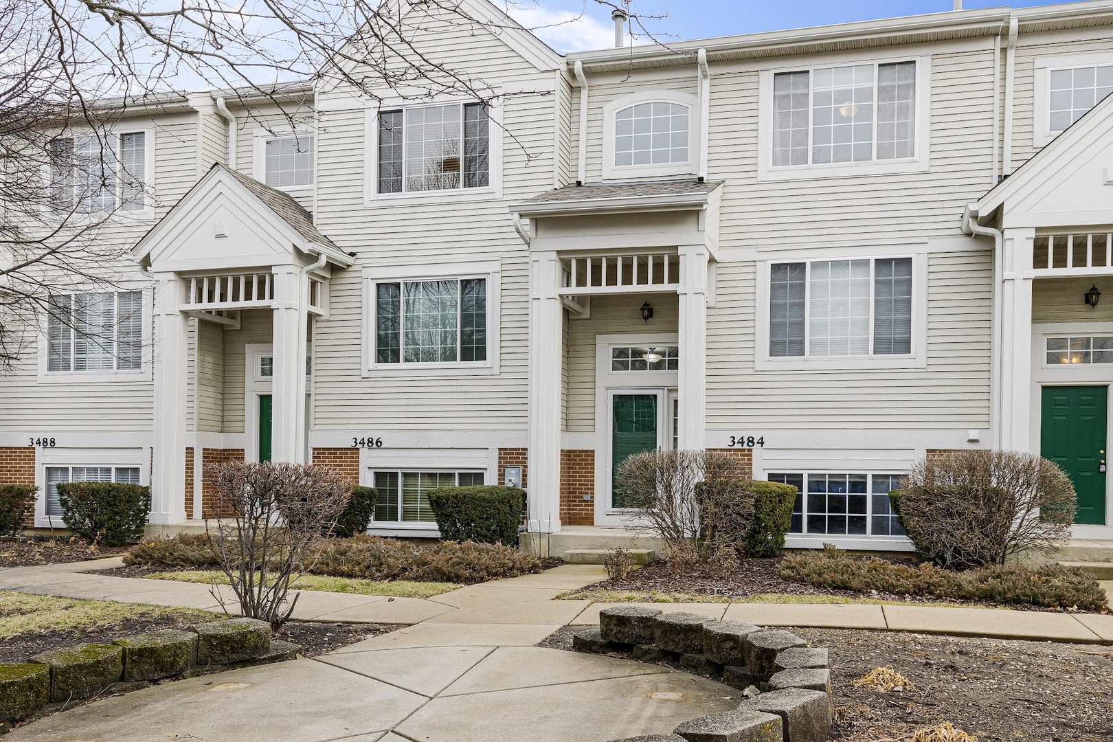 3484 Ravinia Circle Aurora, IL 60504 - Photo 1 of 26 a front view of a house with a yard