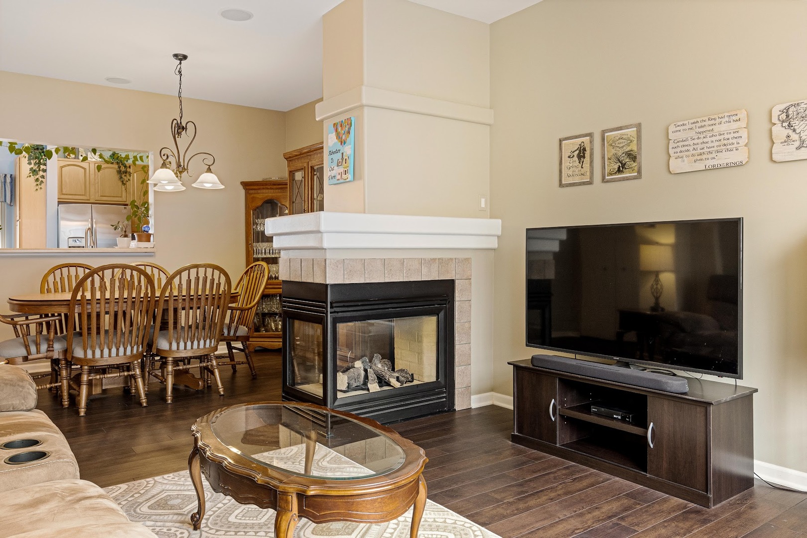 3484 Ravinia Circle Aurora, IL 60504 - Photo 2 of 26 a living room with furniture and a flat screen tv