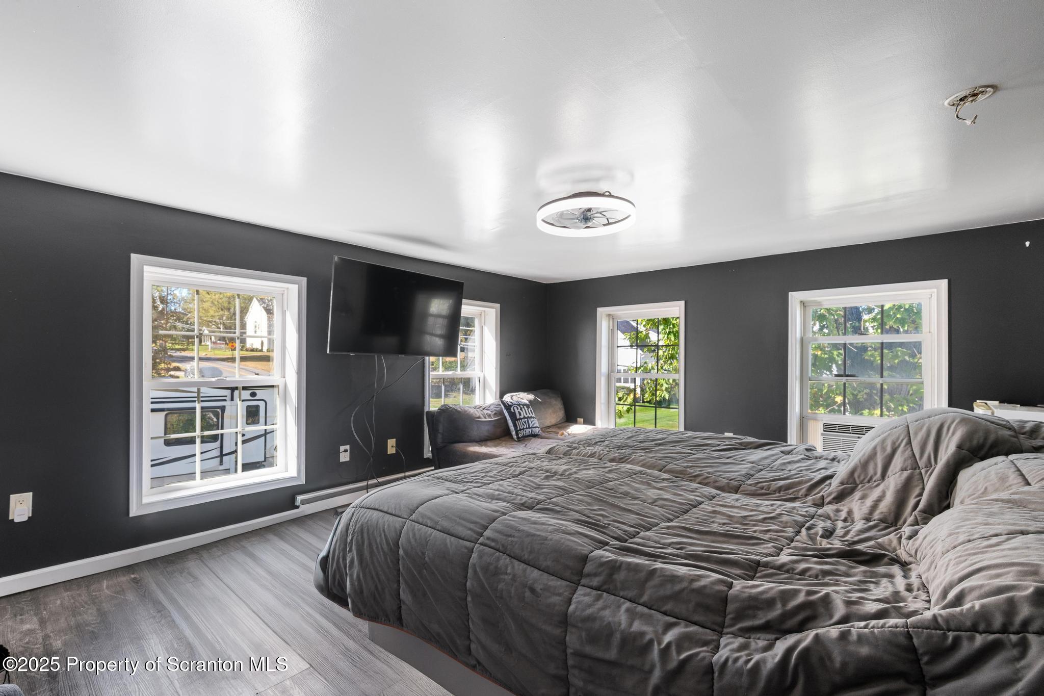 22 Creamery Road Tunkhannock, PA 18657 - Photo 14 of 39 a bedroom with a large bed and a window