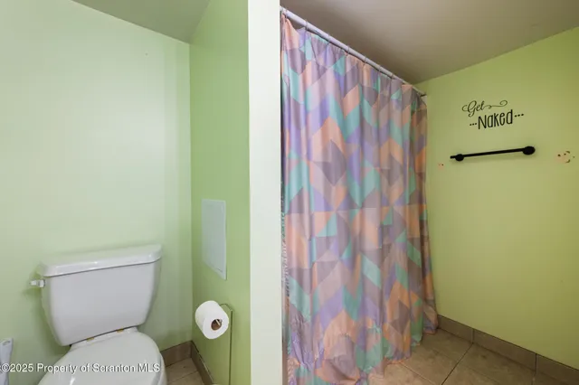 a view of a backyard with sitting area