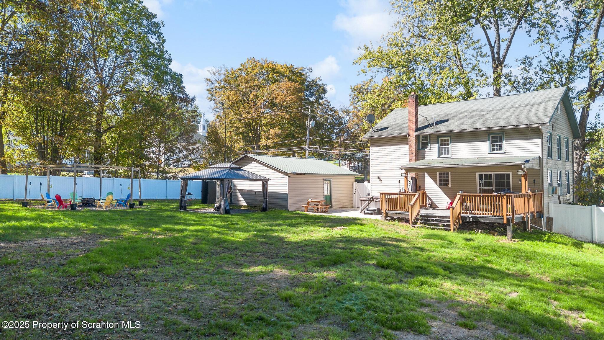 22 Creamery Road Tunkhannock, PA 18657 - Photo 35 of 39 a view of a house with a yard and sitting area
