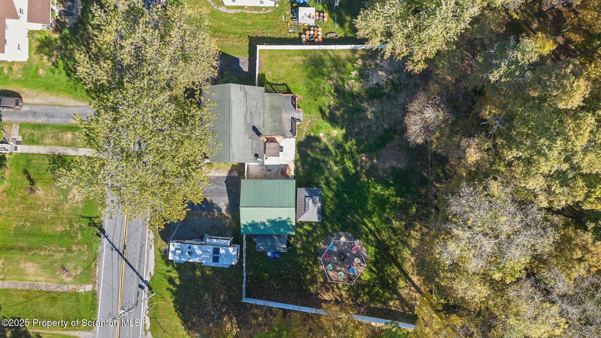 22 Creamery Road Tunkhannock, PA 18657 - Photo 37 of 39 an aerial view of residential house with outdoor space and trees all around