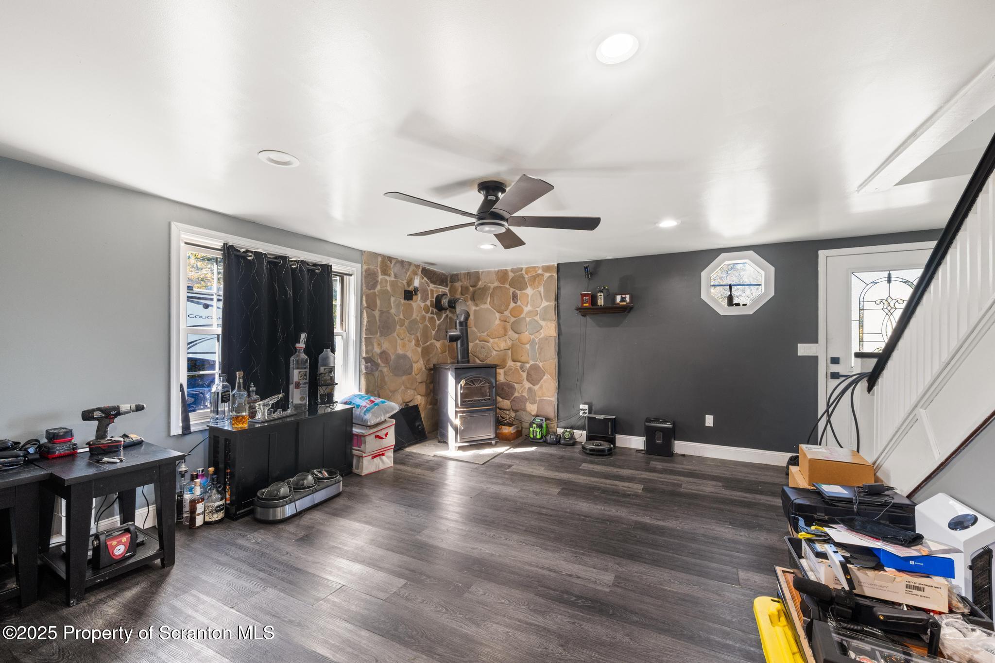 22 Creamery Road Tunkhannock, PA 18657 - Photo 6 of 39 a living room with furniture and a flat screen tv