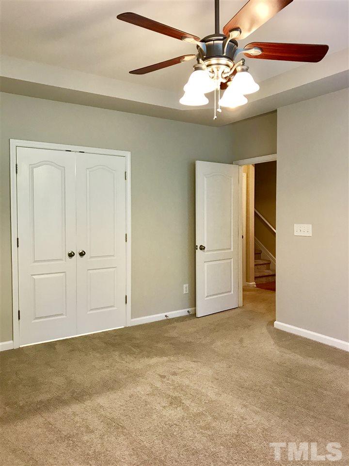 3409 Secretariat Way Raleigh, NC 27614 - Photo 18 of 30 Large master bedroom, french doors lead you into the master bathroom.
