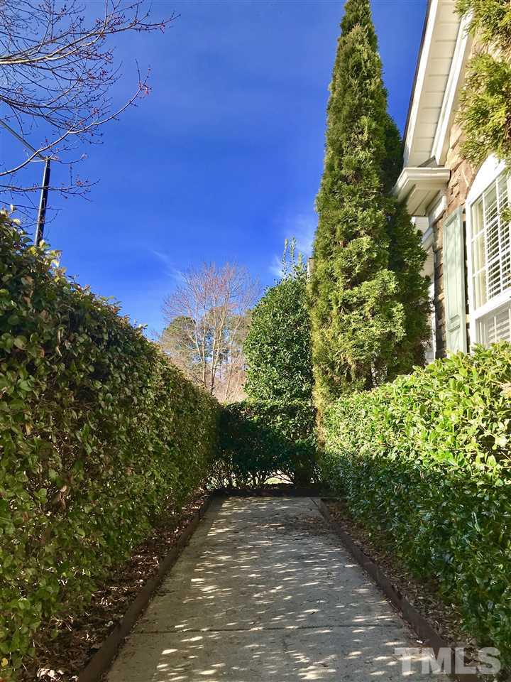 3409 Secretariat Way Raleigh, NC 27614 - Photo 5 of 30 Walkway entering the home.