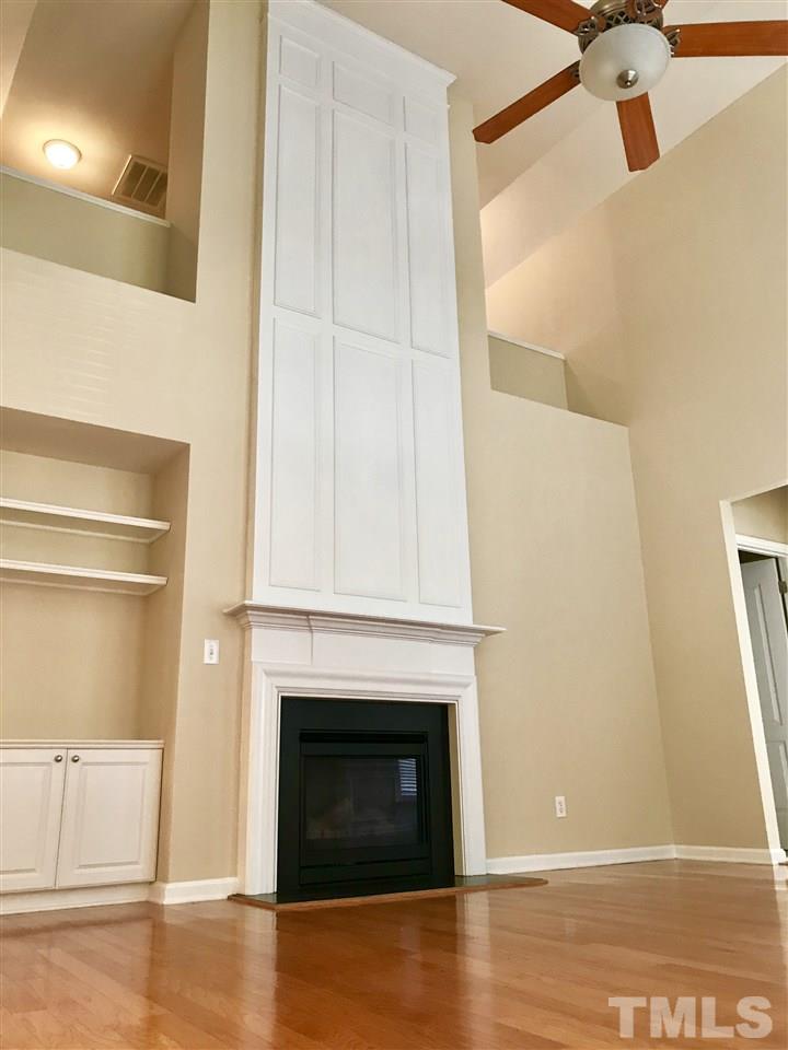 3409 Secretariat Way Raleigh, NC 27614 - Photo 10 of 30 Beautiful 2 story fireplace. It is an amazing focal point.