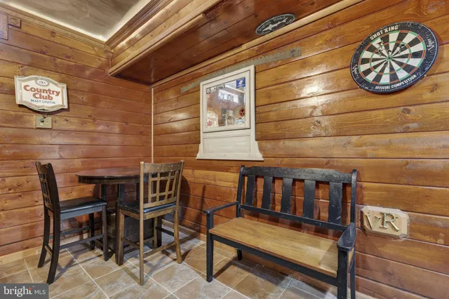 a view of a chairs with wooden floor
