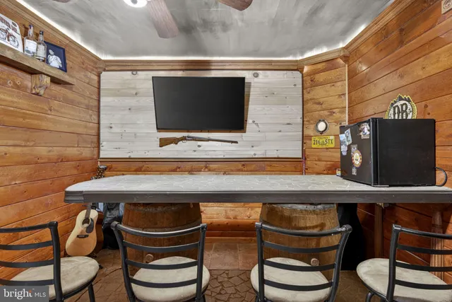 a bathroom with a toilet a sink and a mirror