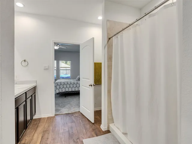 a view of a livingroom with a furniture and a window