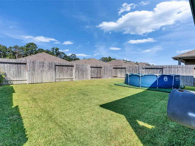 a house view with a garden space