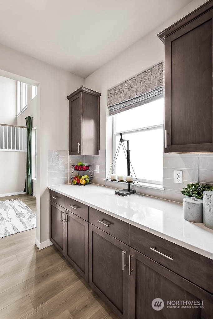 16213 Southeast 133rd Place, Unit 113 Renton, WA 98059 - Photo 14 of 30 a kitchen with a sink and a window