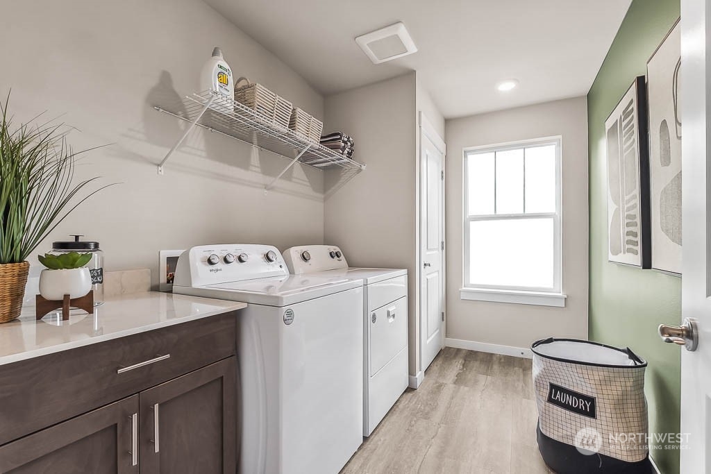 16213 Southeast 133rd Place, Unit 113 Renton, WA 98059 - Photo 24 of 30 a utility room with dryer and washer