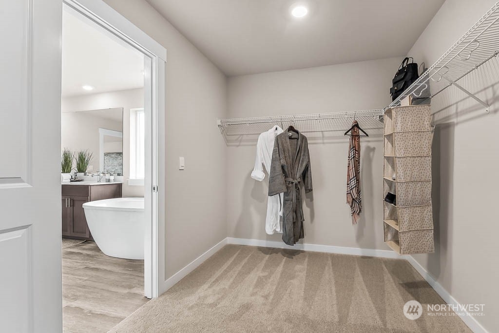 16213 Southeast 133rd Place, Unit 113 Renton, WA 98059 - Photo 28 of 30 a view of a bathroom with a tub and shower