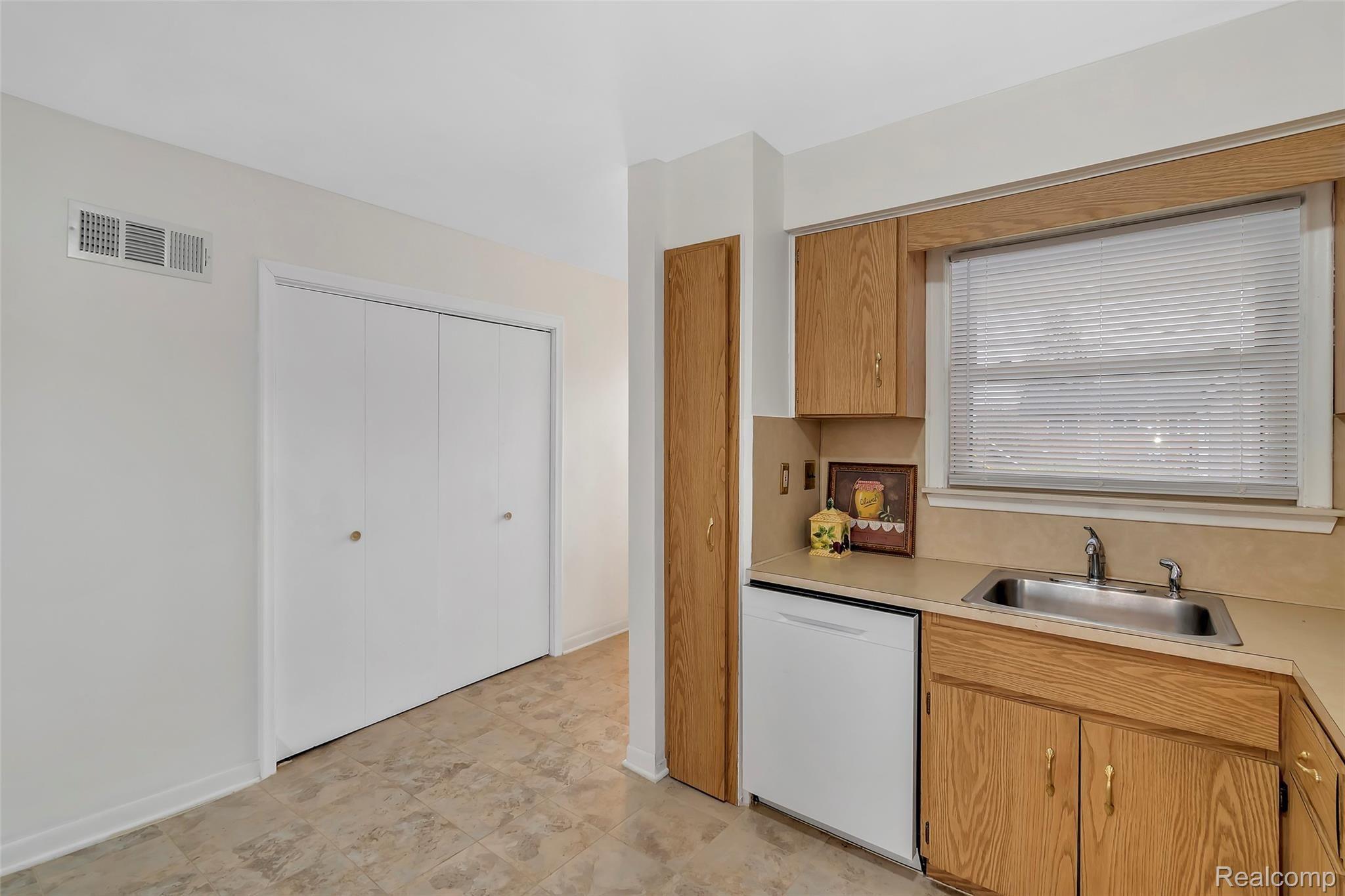 15125 Inkster Road Livonia, MI 48154 - Photo 8 of 14 Kitchen to hallway