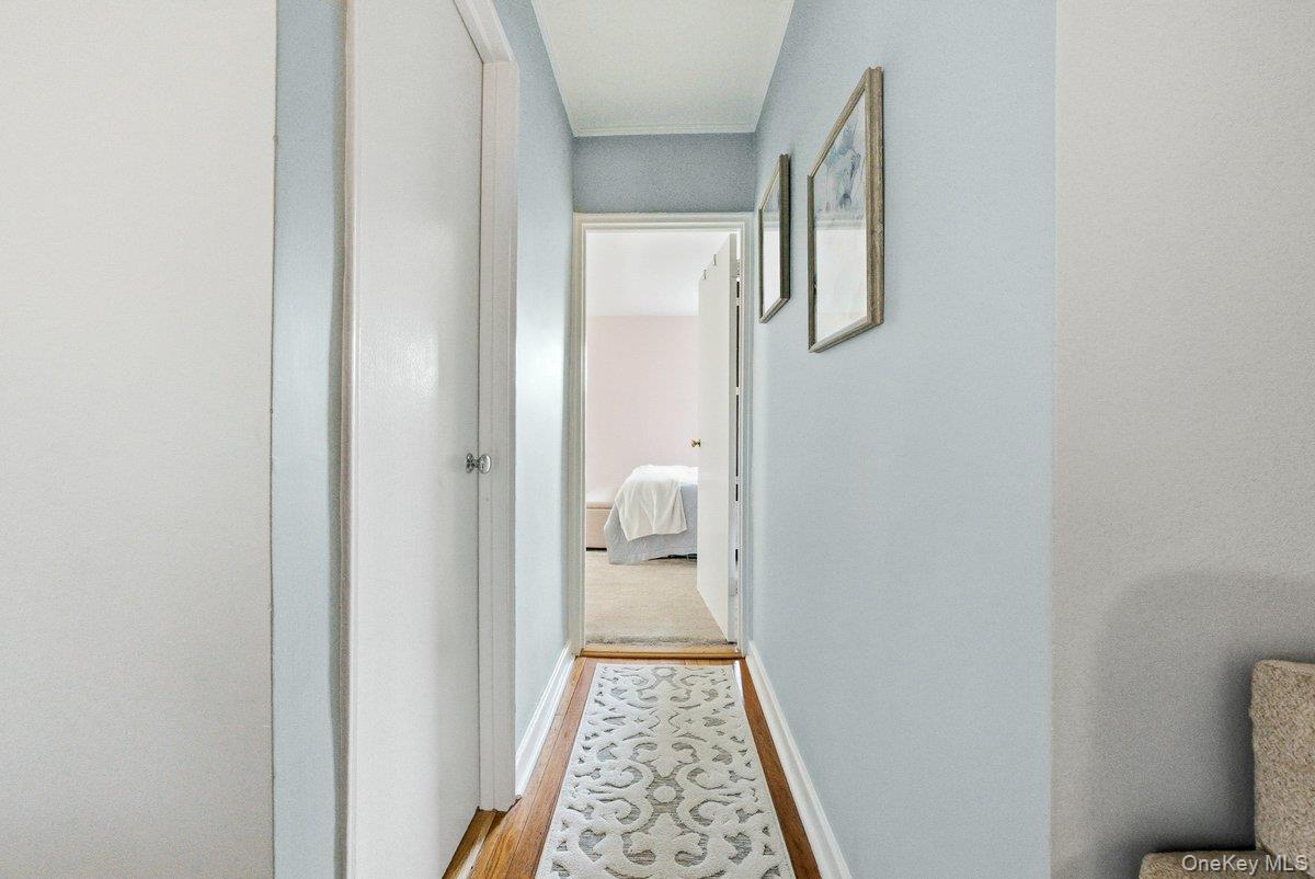 781 Palmer Road, Unit 2D Yonkers, NY 10708 - Photo 10 of 17 a view of hallway with wooden floor