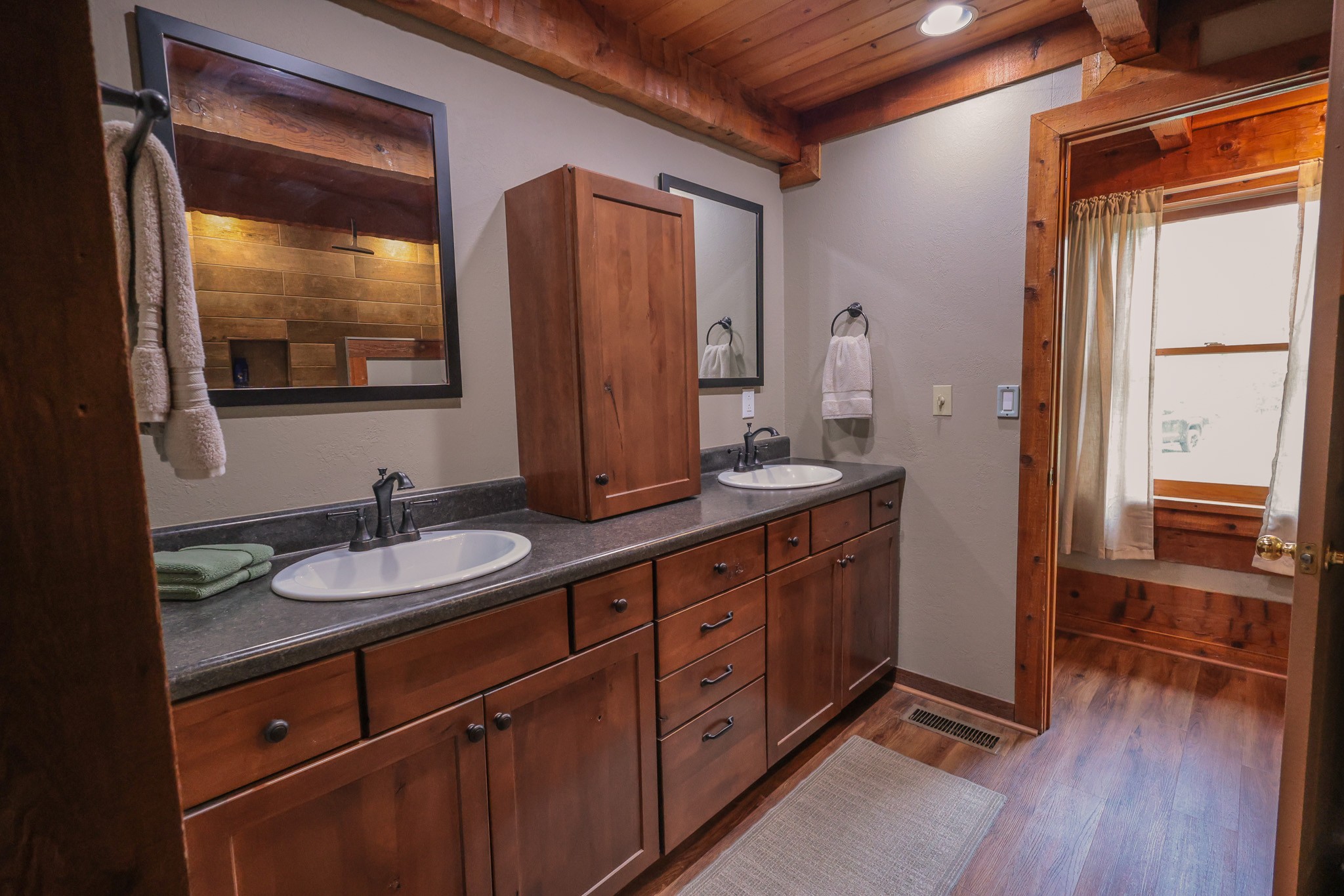 1854 Catoosa Road Wartburg, TN 37887 - Photo 58 of 100 a spacious bathroom with a double vanity sink and a mirror