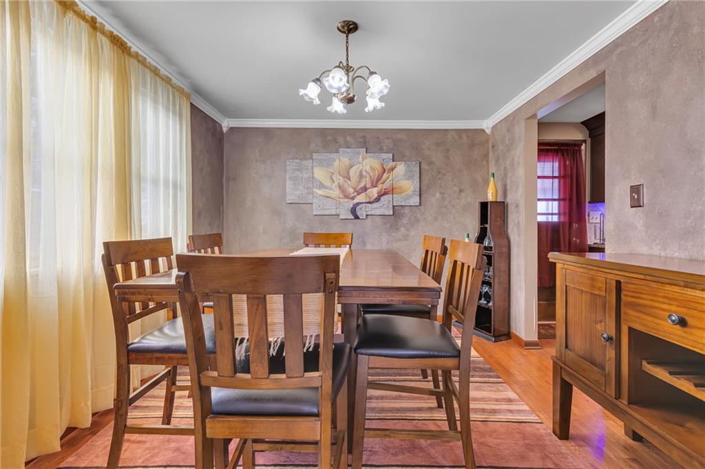 1281 Chapel Road Monaca, PA 15061 - Photo 5 of 34 Dining room with hardwood floors and plenty of sunlight.