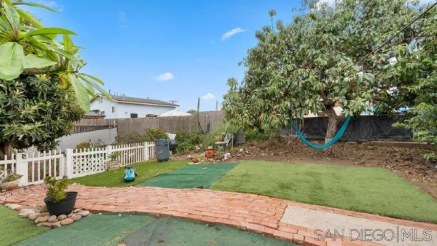 753 Jacumba Street San Diego, CA 92114 - Photo 22 of 22 a view of a garden with a fountain