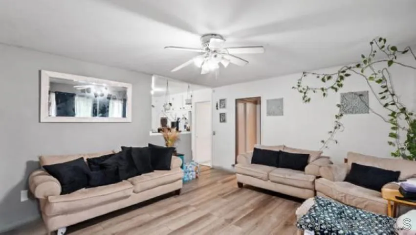 753 Jacumba Street San Diego, CA 92114 - Photo 5 of 22 a living room with furniture and a ceiling fan