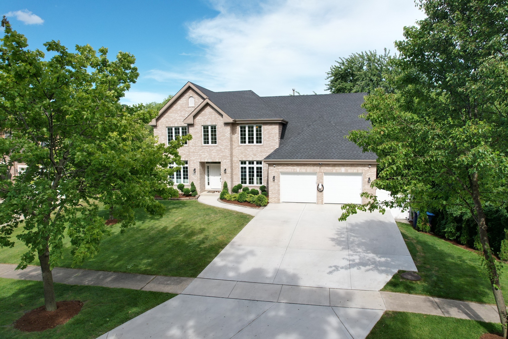 9033 Kearney Road Darien, IL 60561 - Photo 1 of 38 front view of a house with a yard