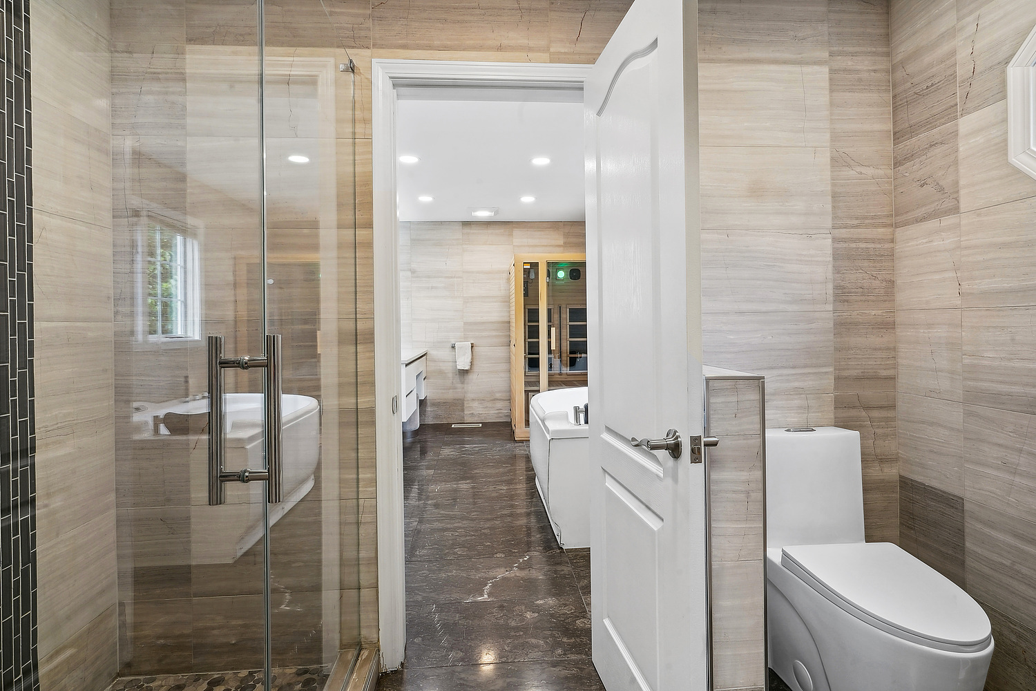 9033 Kearney Road Darien, IL 60561 - Photo 31 of 38 a bathroom with a toilet and a shower