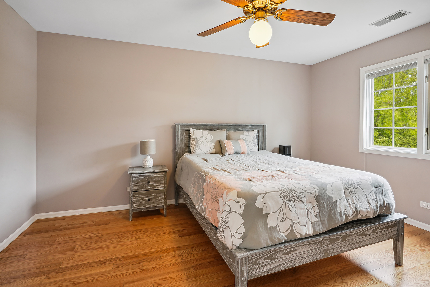 9033 Kearney Road Darien, IL 60561 - Photo 32 of 38 a bedroom with a bed and a table
